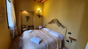 Suite Junior (3 pax) | 1 kamar tidur, seprai katun Mesir, selimut bulu angsa, dan brankas