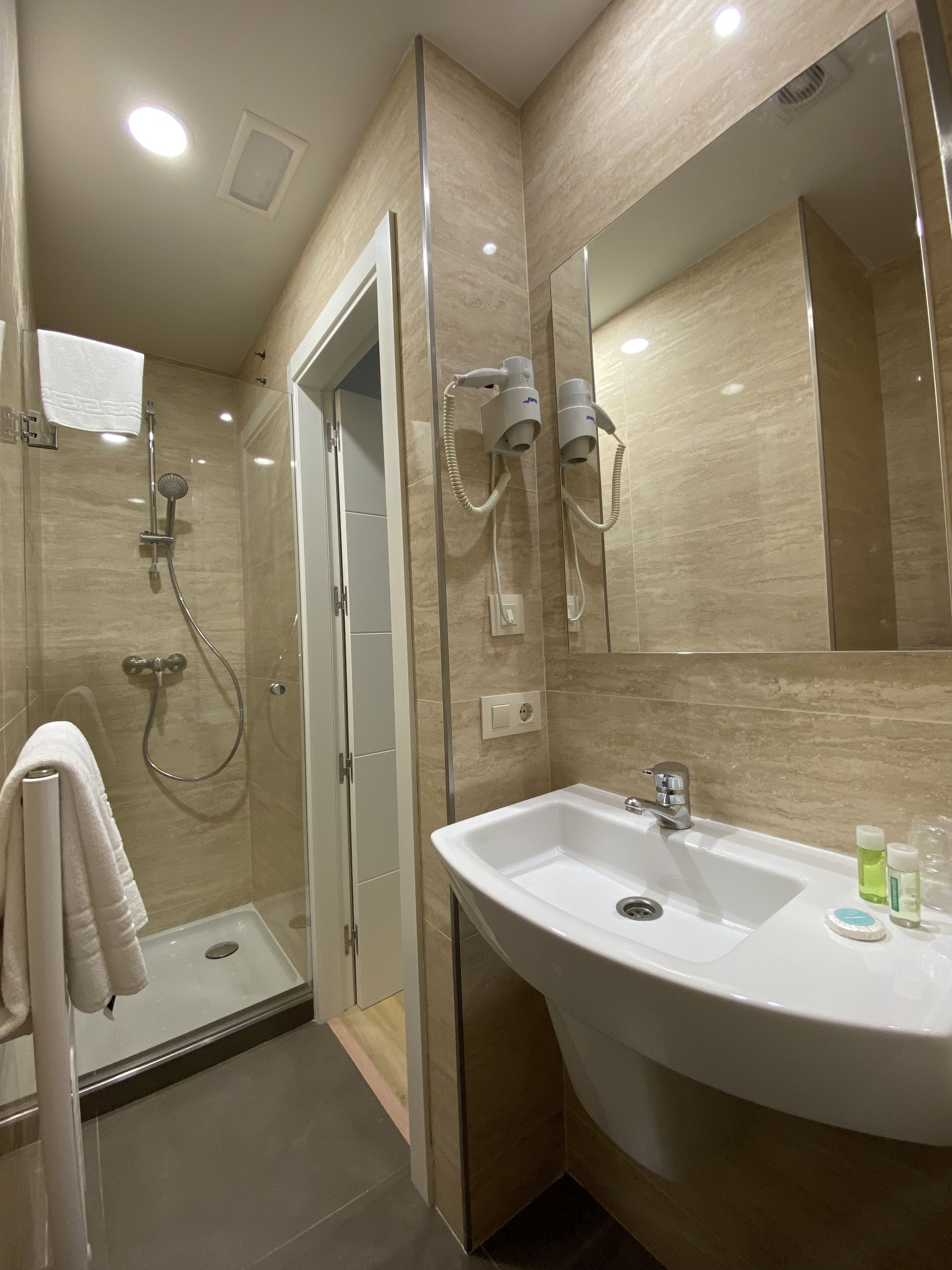 economy single room | bathroom | rainfall showerhead, free toiletries, hair dryer, bidet