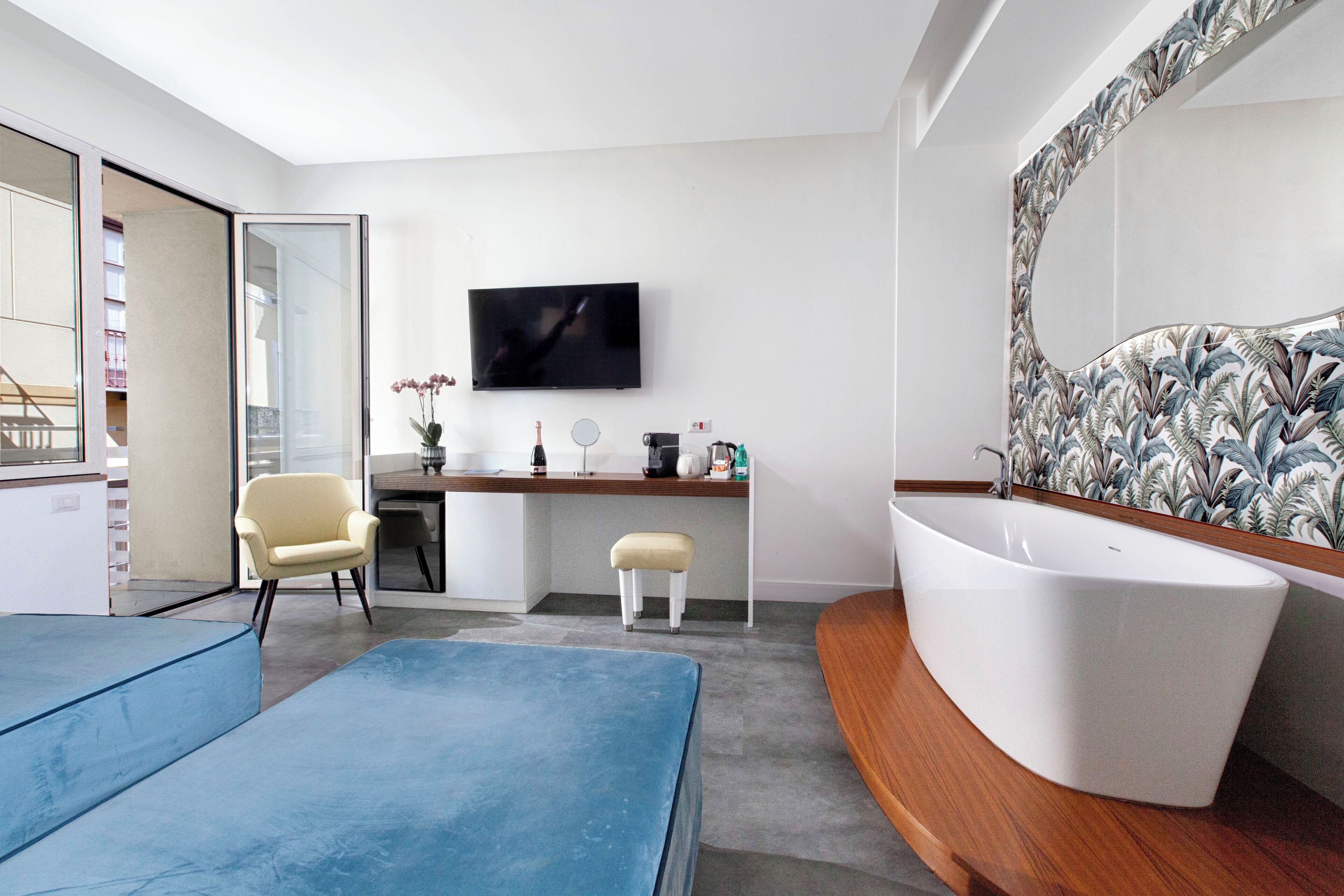 deluxe suite | premium bedding, down duvets, in-room safe, desk