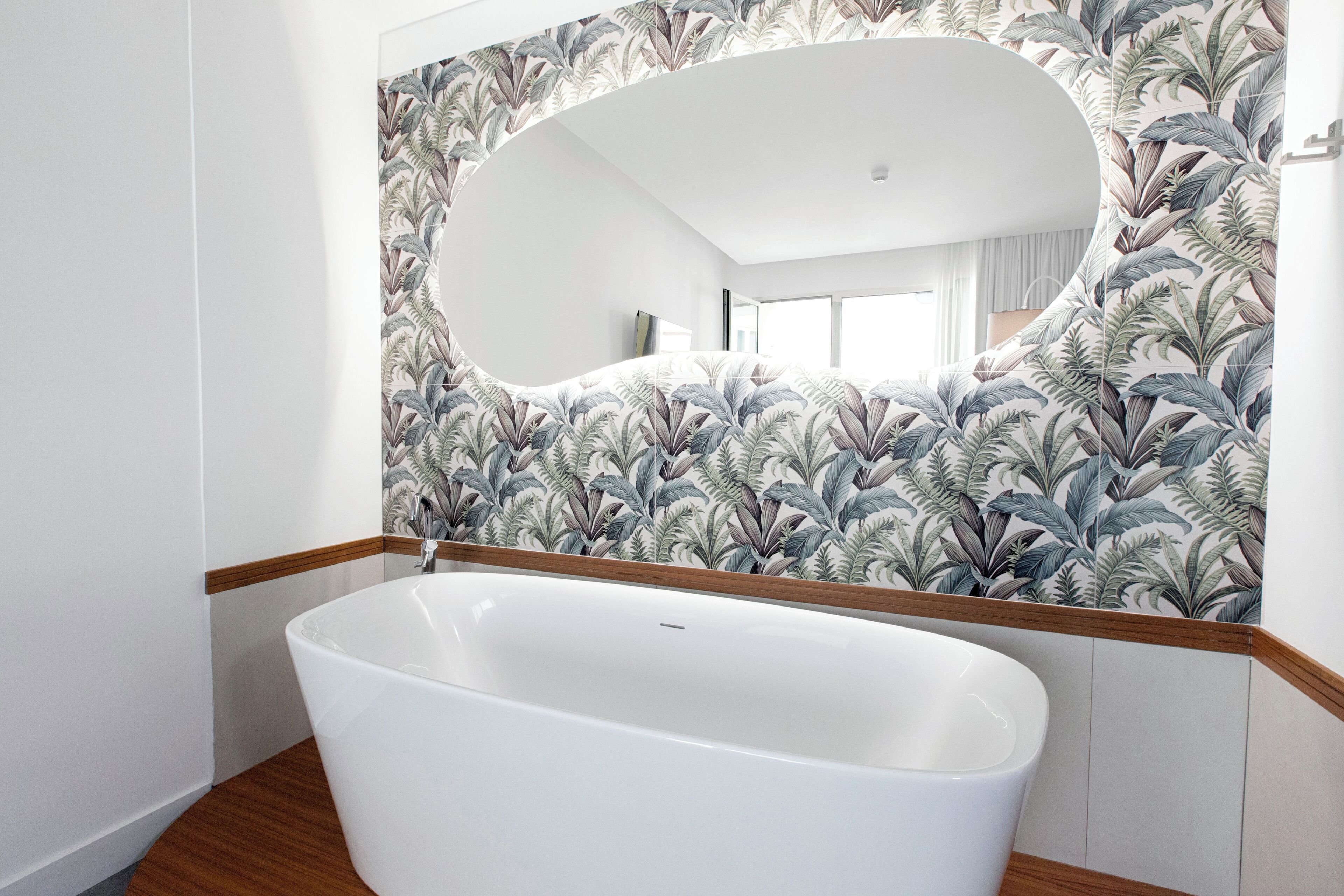 deluxe suite | premium bedding, down duvets, in-room safe, desk