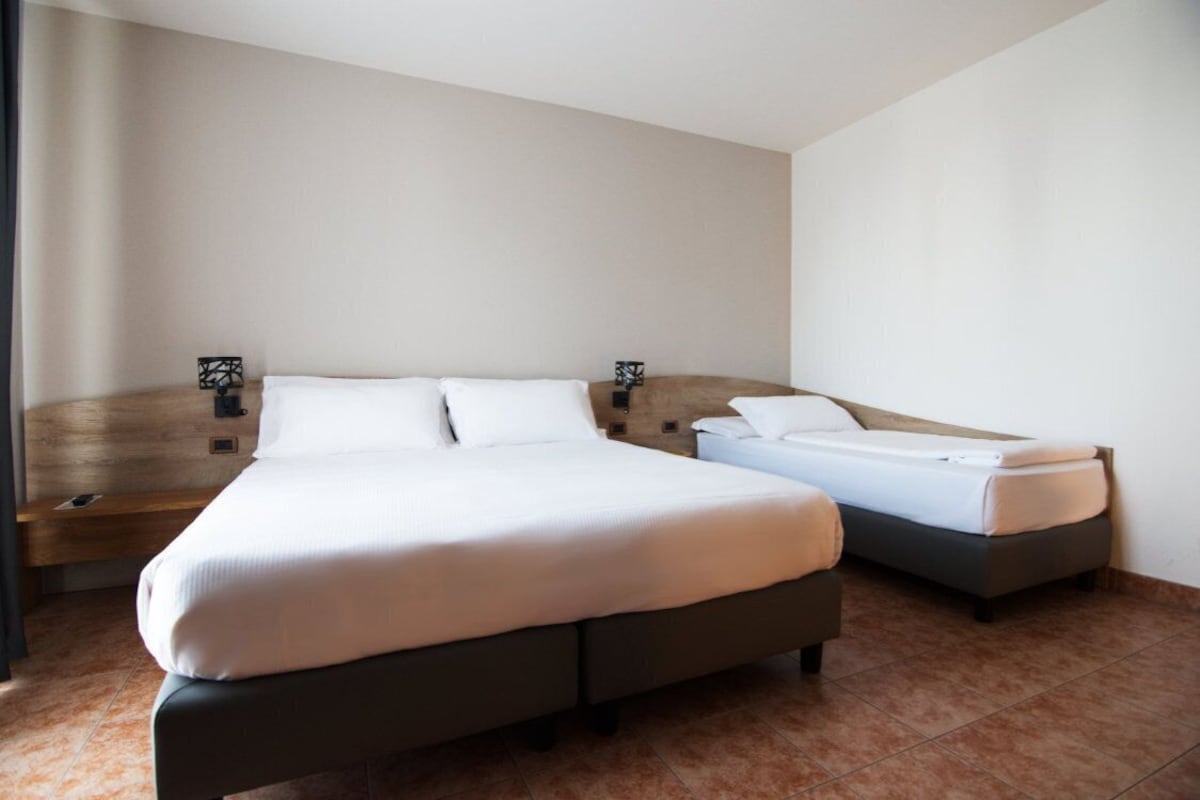 Premium bedding, down comforters, in-room safe, desk