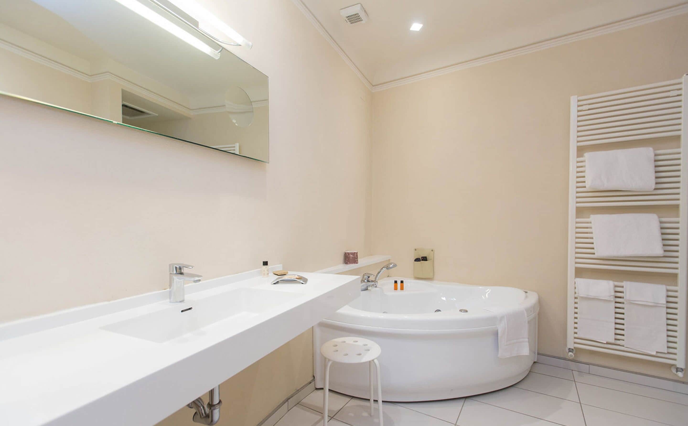superior double room | bathroom | free toiletries, hair dryer, bathrobes, slippers