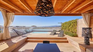 Suite 1 Dormitorio, Ático, Piscina | Terraza o patio