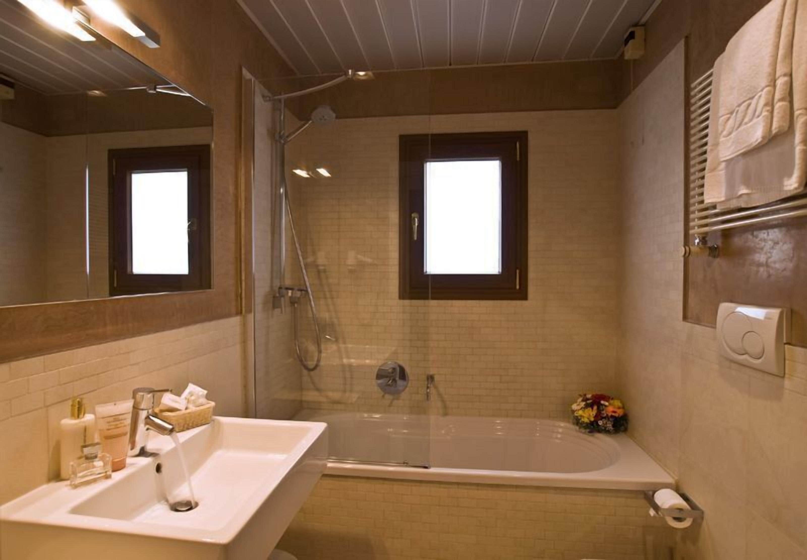 free toiletries, hair dryer, slippers, bidet