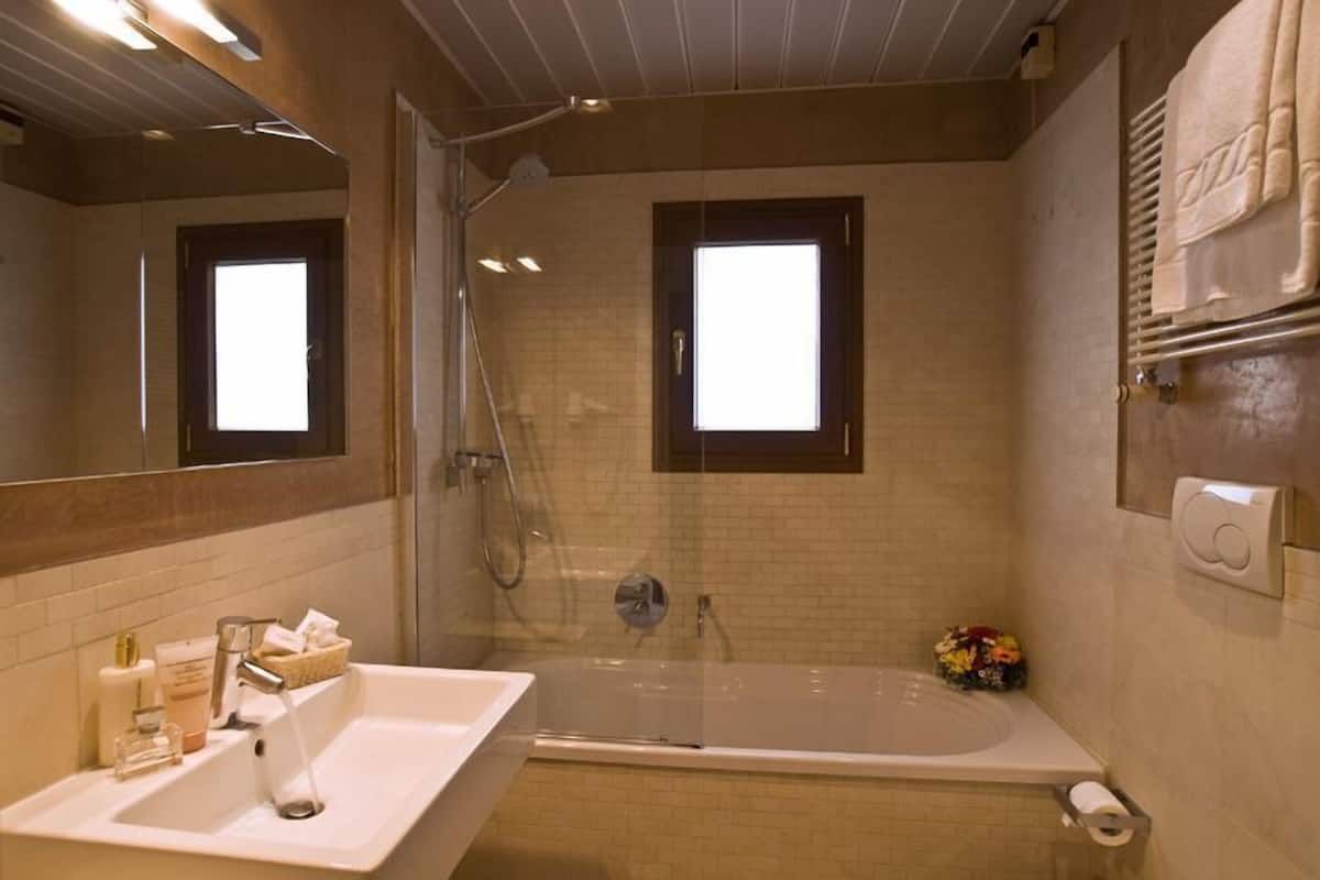 free toiletries, hair dryer, slippers, bidet