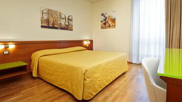 Hypo-allergenic bedding, minibar, in-room safe, desk