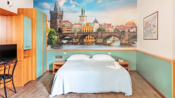 Superior Triple Room | Minibar, in-room safe, desk, blackout drapes