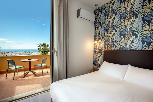 Double or Twin Room, Sea View | Memory foam beds, in-room safe, desk, iron/ironing board