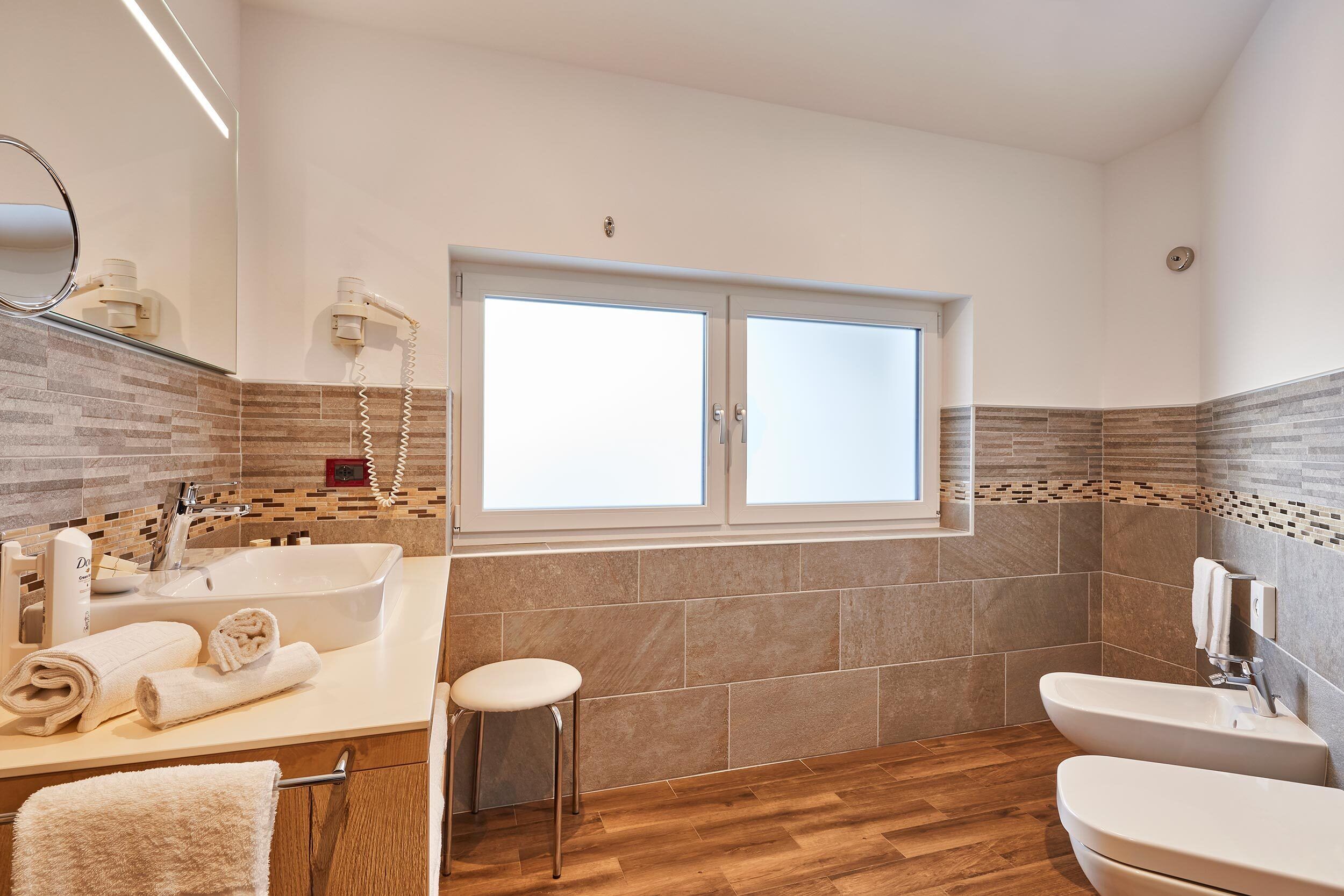 superior quadruple room | bathroom | designer toiletries, hair dryer, bathrobes, slippers