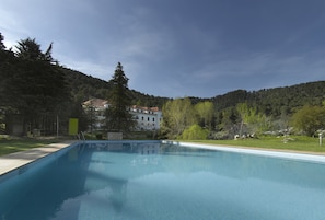 Outdoor pool, pool umbrellas, pool loungers