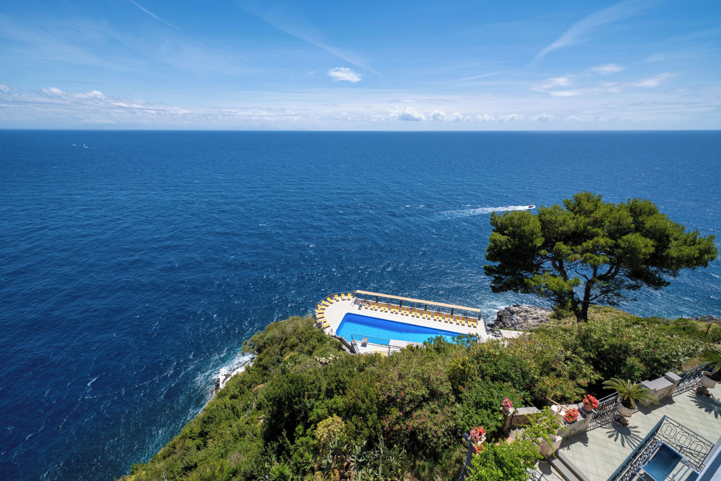 Outdoor pool, open 8:00 AM to 6:30 PM, pool umbrellas, sun loungers