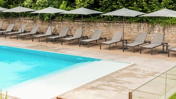Outdoor pool, pool umbrellas, pool loungers