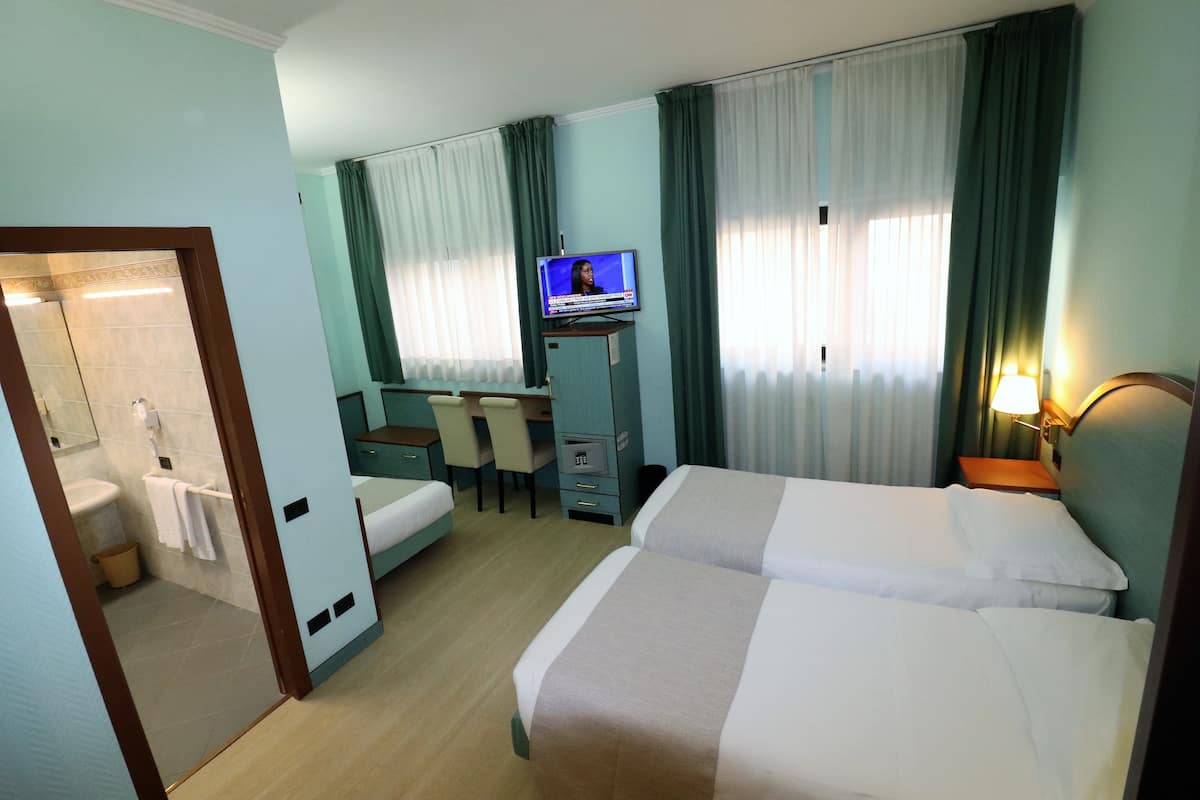 Triple Room | Down duvets, minibar, in-room safe, desk