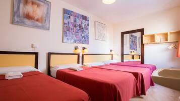 Quadruple Room, Shared Bathroom | Individually furnished, blackout drapes, free cribs/infant beds