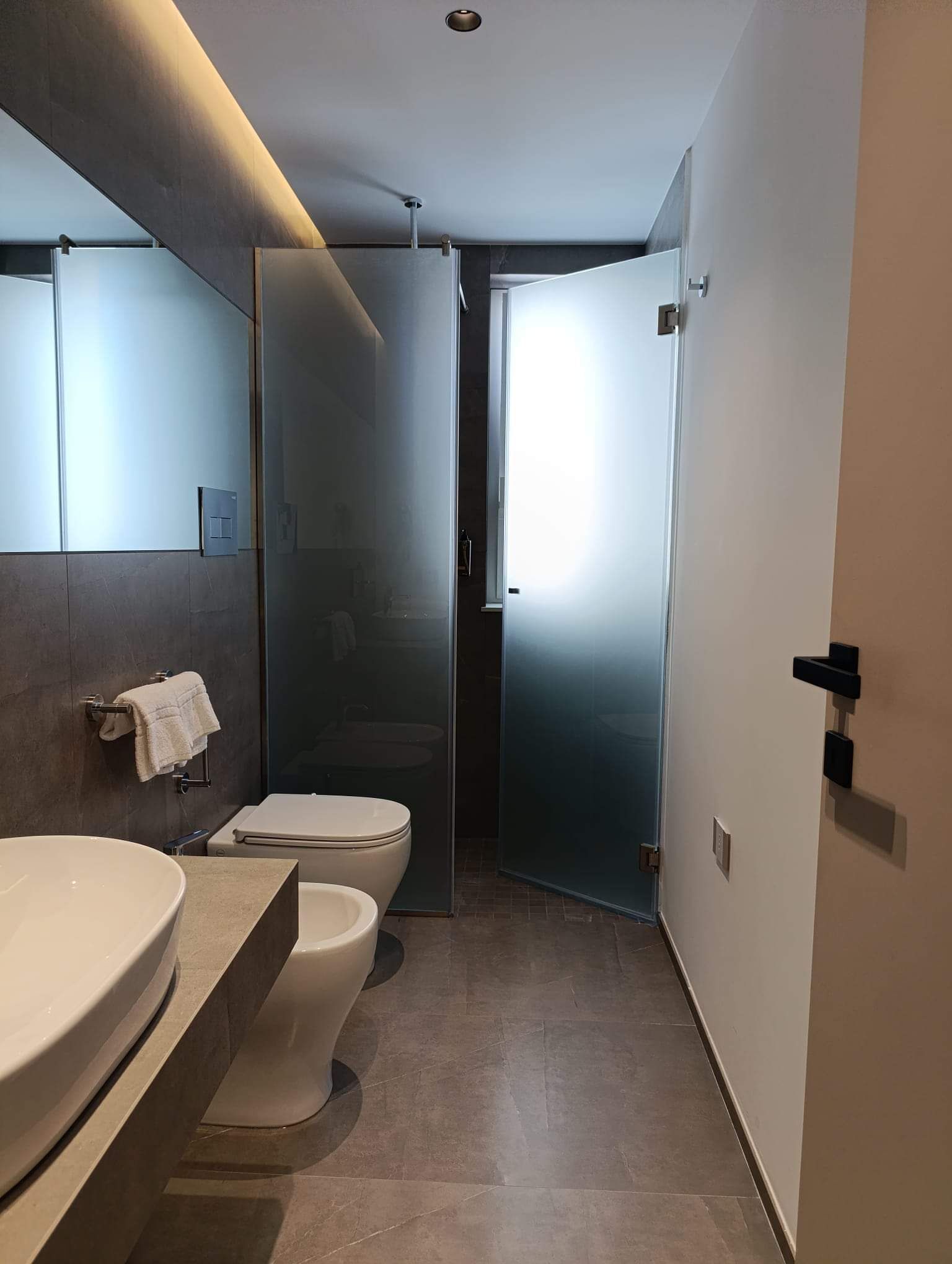 hair dryer, bathrobes, slippers, bidet