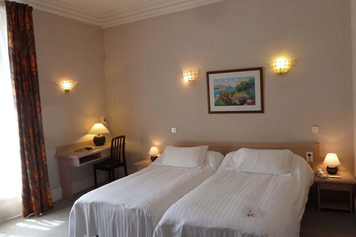 standard twin room | in-room safe, desk, iron/ironing board, free wifi