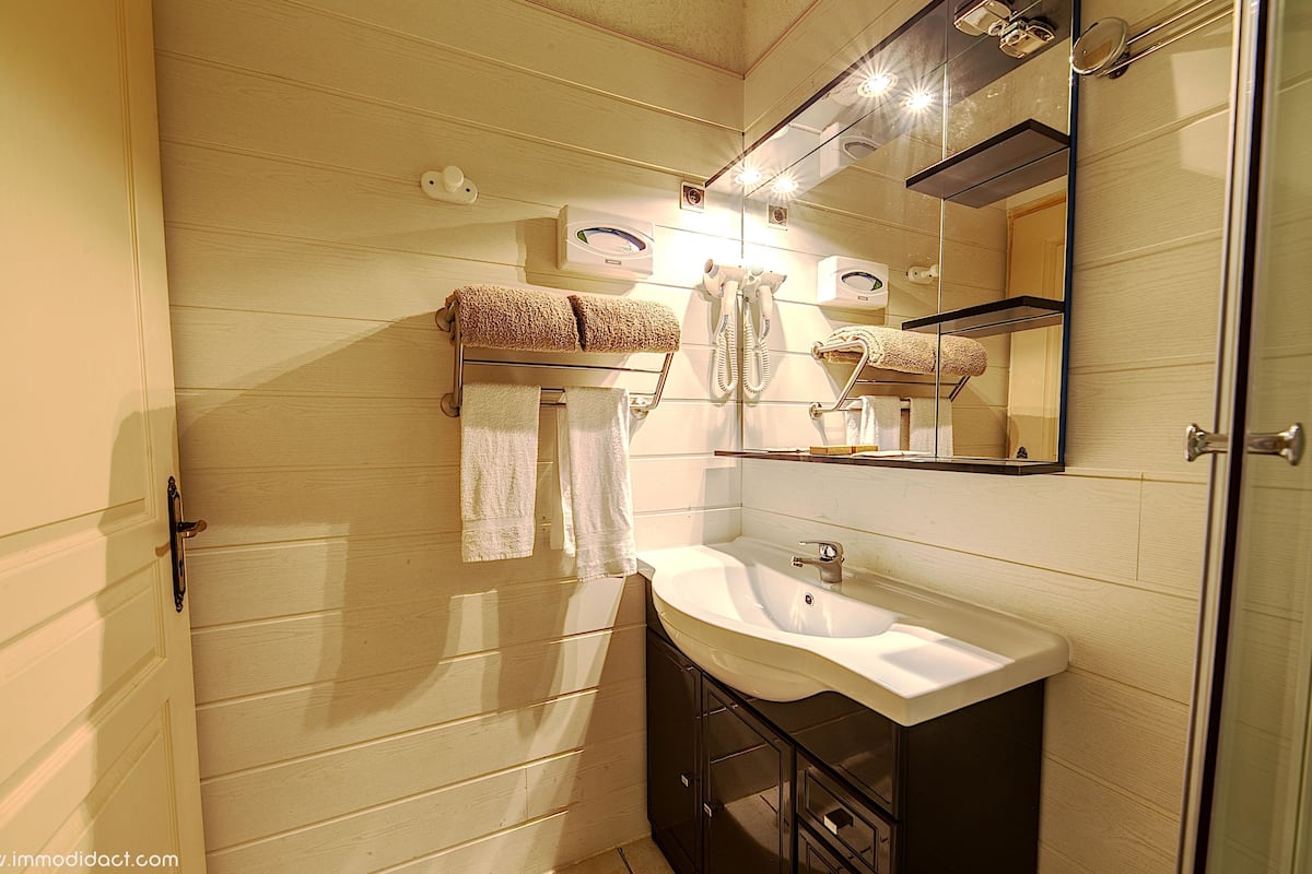 twin room, 2 single beds | bathroom amenities | shower, rainfall showerhead, hair dryer, towels