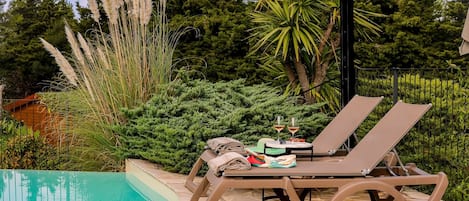Seasonal outdoor pool, pool umbrellas, sun loungers