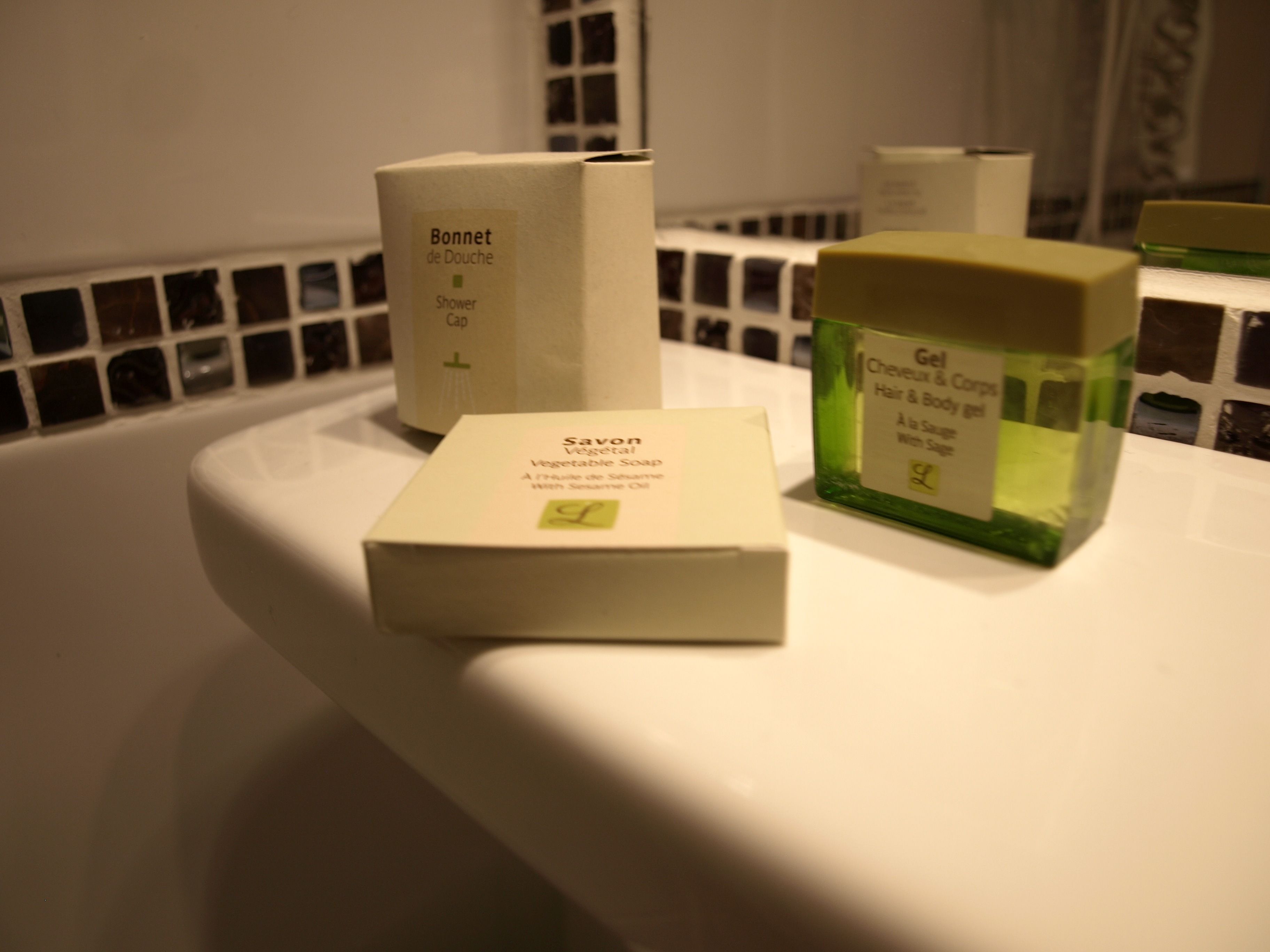 eco-friendly toiletries, hair dryer, towels, soap