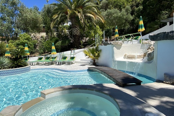 Seasonal outdoor pool, open 9:00 AM to 8:30 PM, pool umbrellas