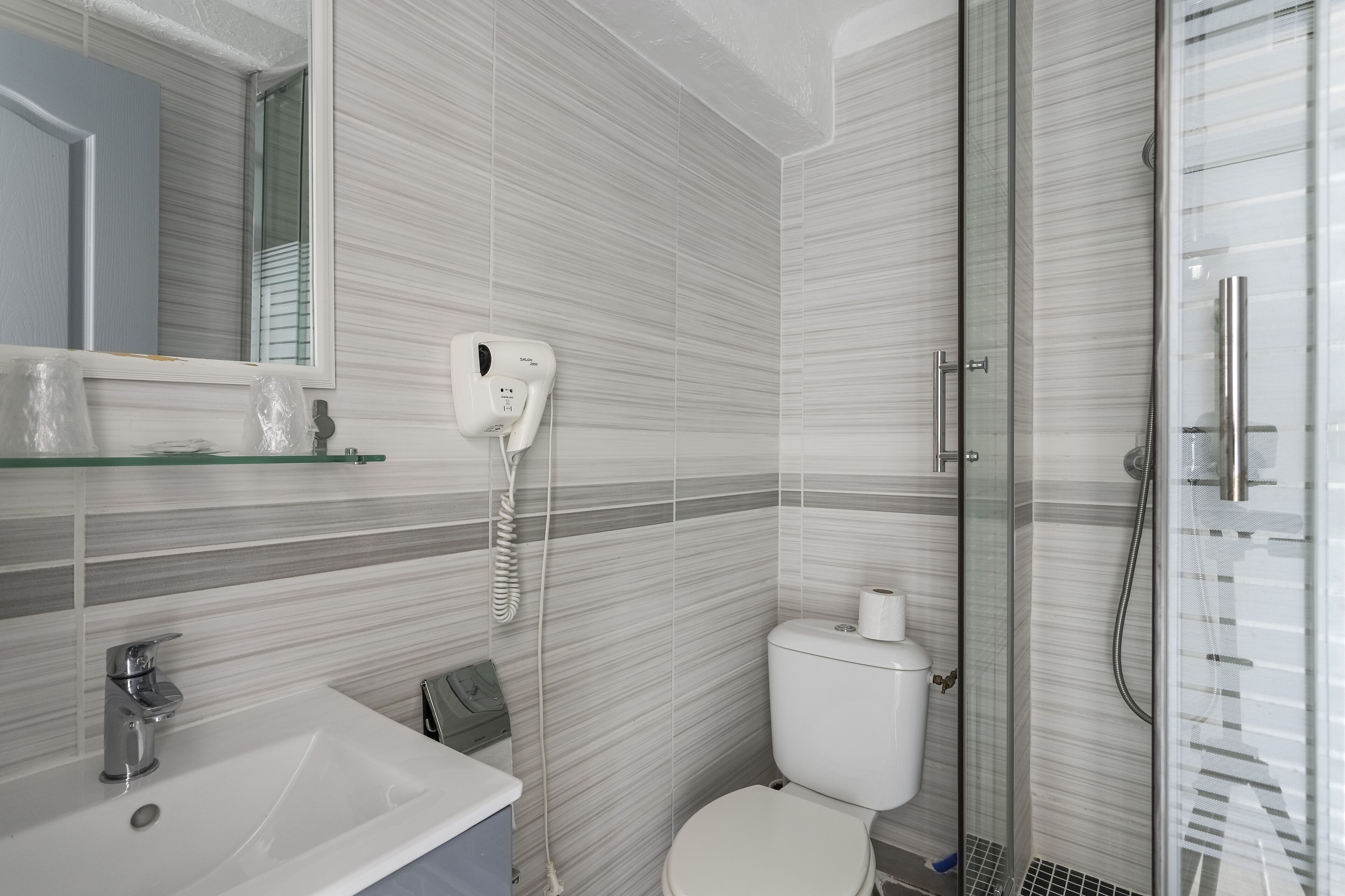 economy double room | bathroom | hair dryer, towels