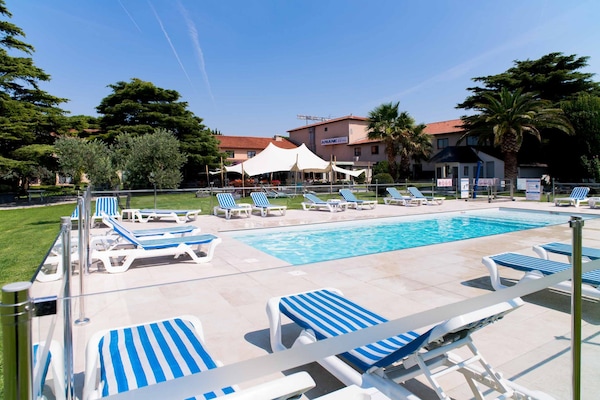 Outdoor pool, sun loungers