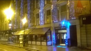 A building with a storefront labeled "Celtic Lodge" and a sign for "SALE" above the entrance. - Celtic Lodge Guesthouse - Restaurant & Bar (Dublin)