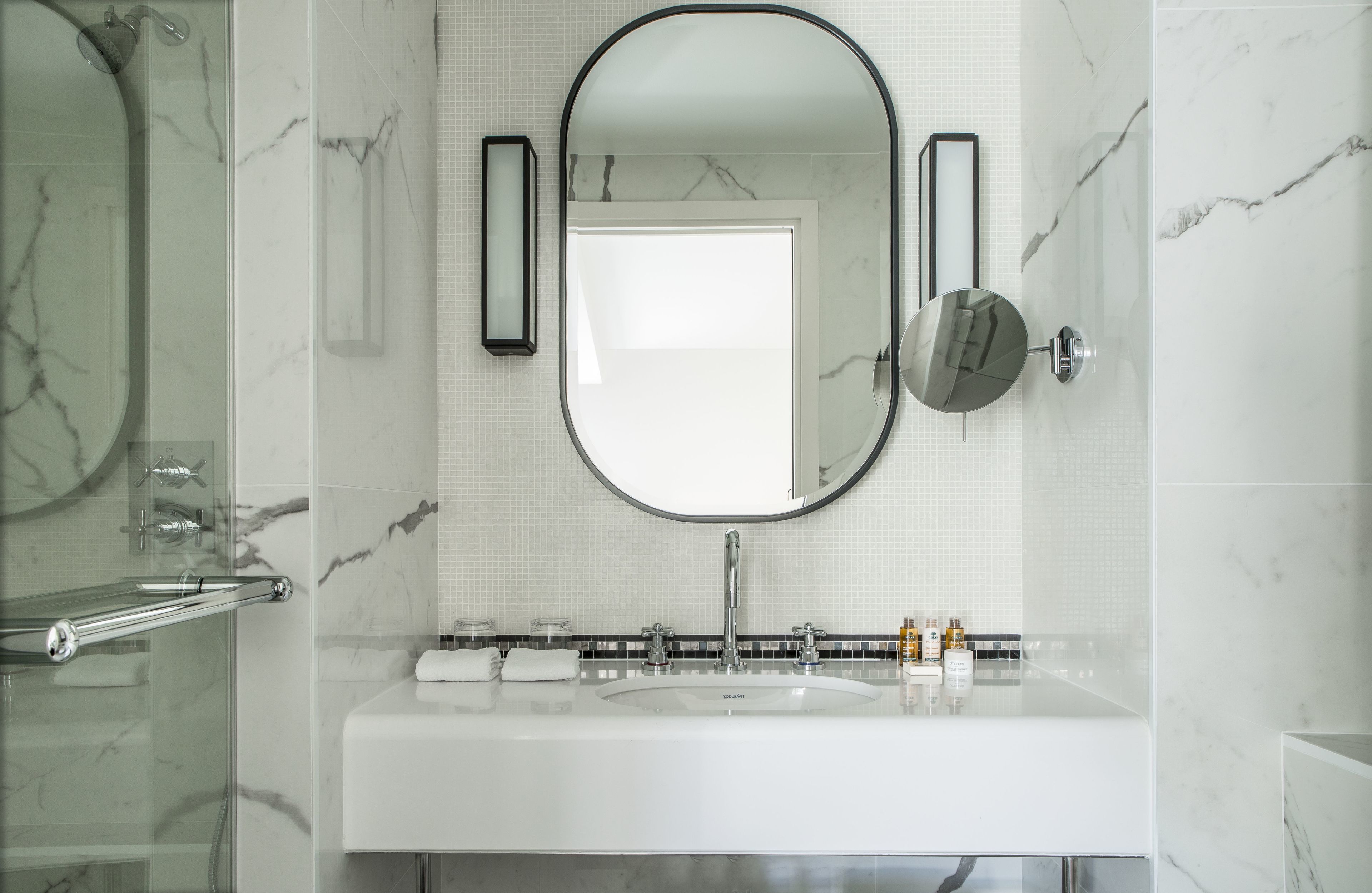 shower, hair dryer, bathrobes, towels