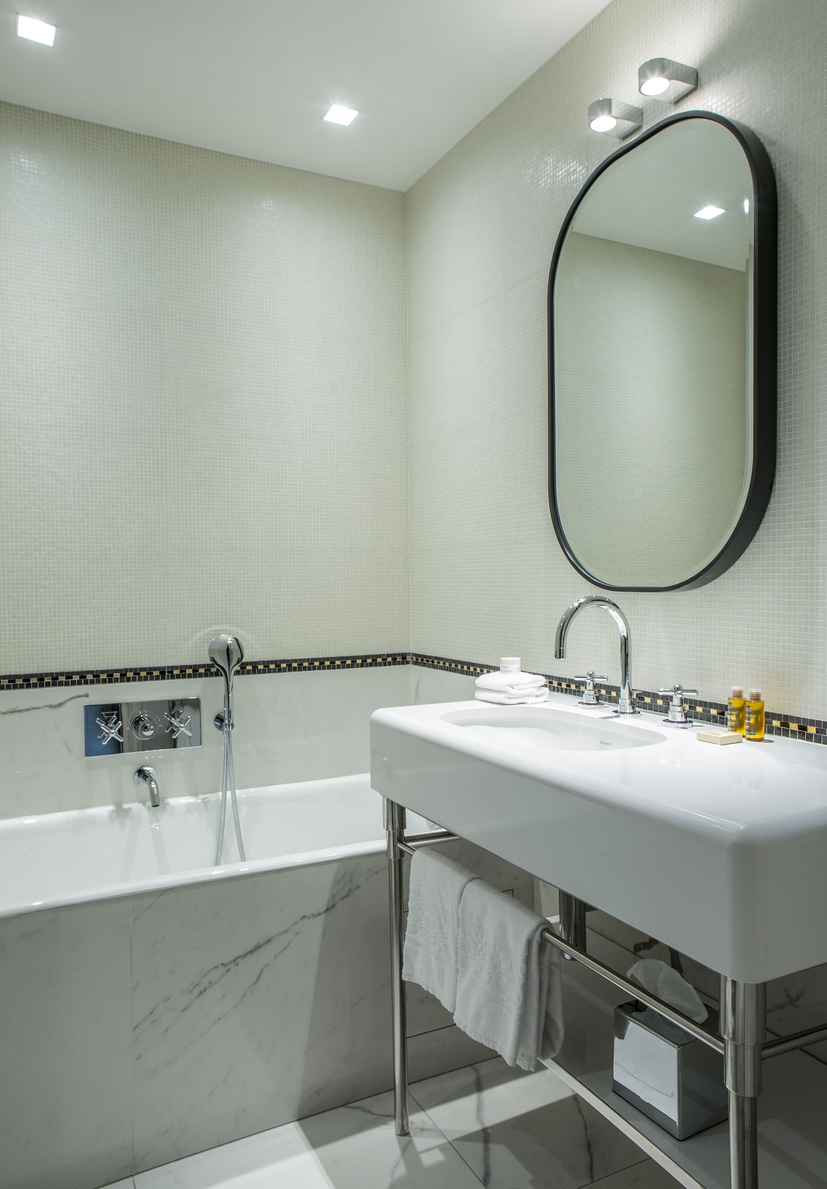 standard double room | bathroom | shower, hair dryer, bathrobes, towels