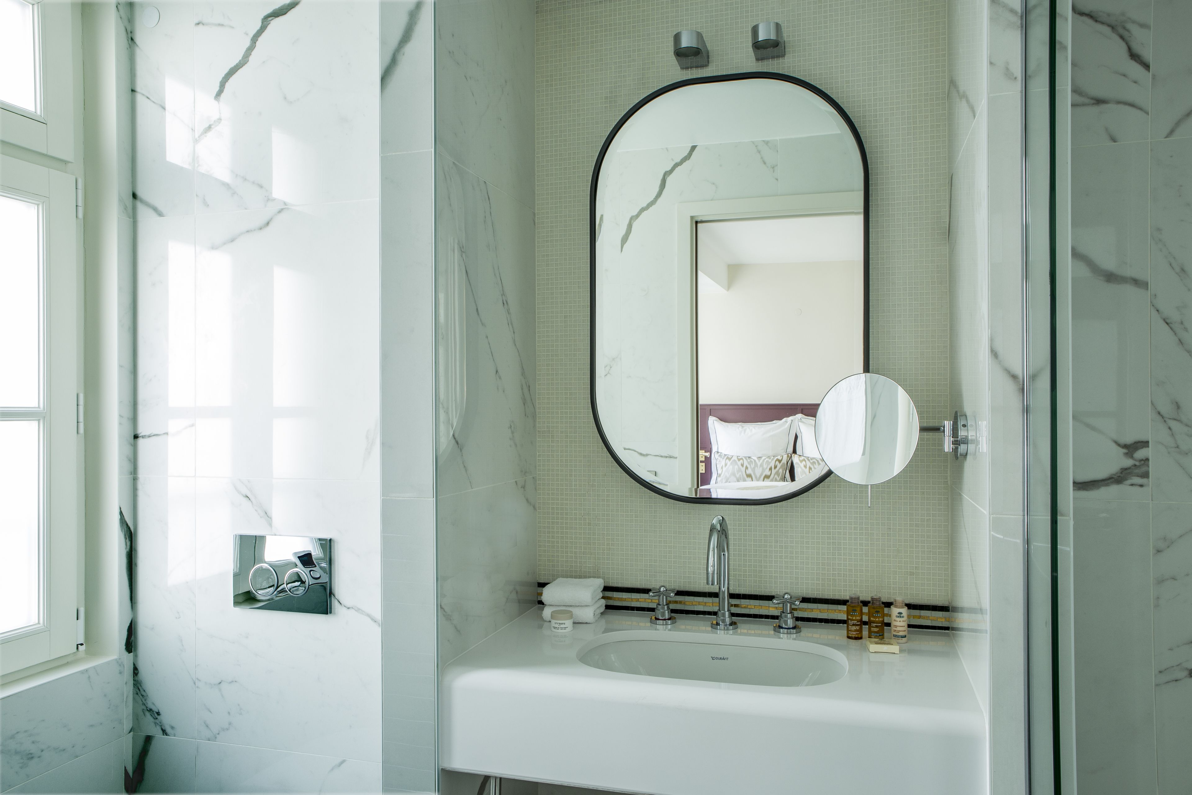 deluxe room | bathroom amenities | shower, hair dryer, bathrobes, towels