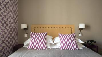 Ropa de cama de alta calidad y minibar