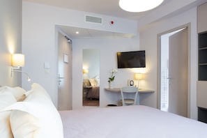 Premium bedding, free minibar, in-room safe, desk