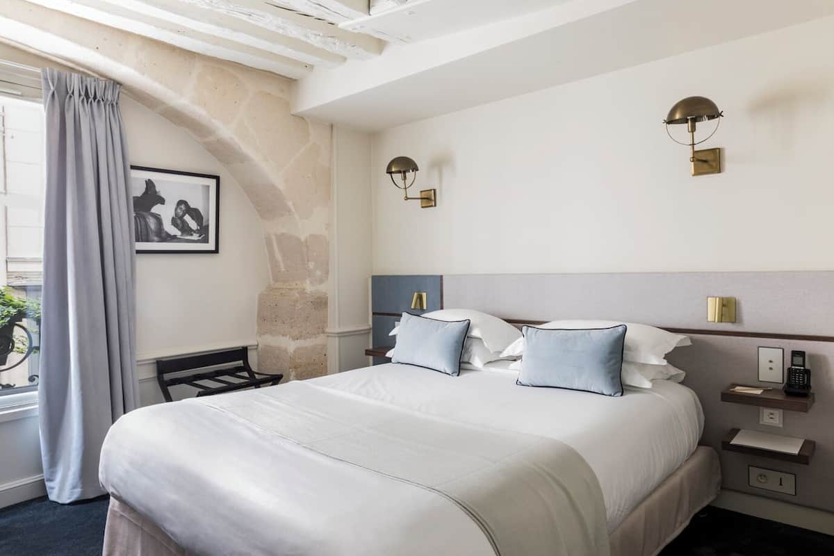 2 quartos, roupas de cama premium, frigobar, cofres nos quartos
