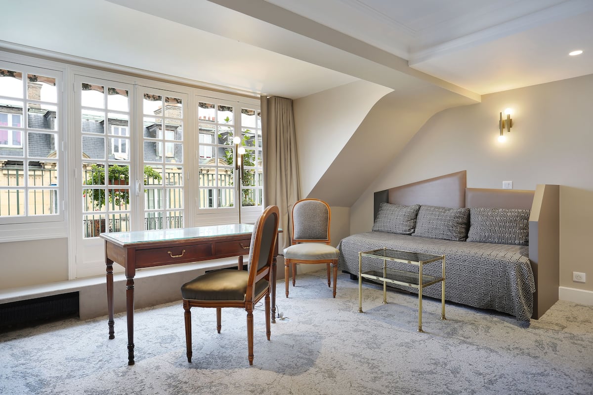 Executive suite | Luxe beddengoed, Select Comfort-bedden, een minibar