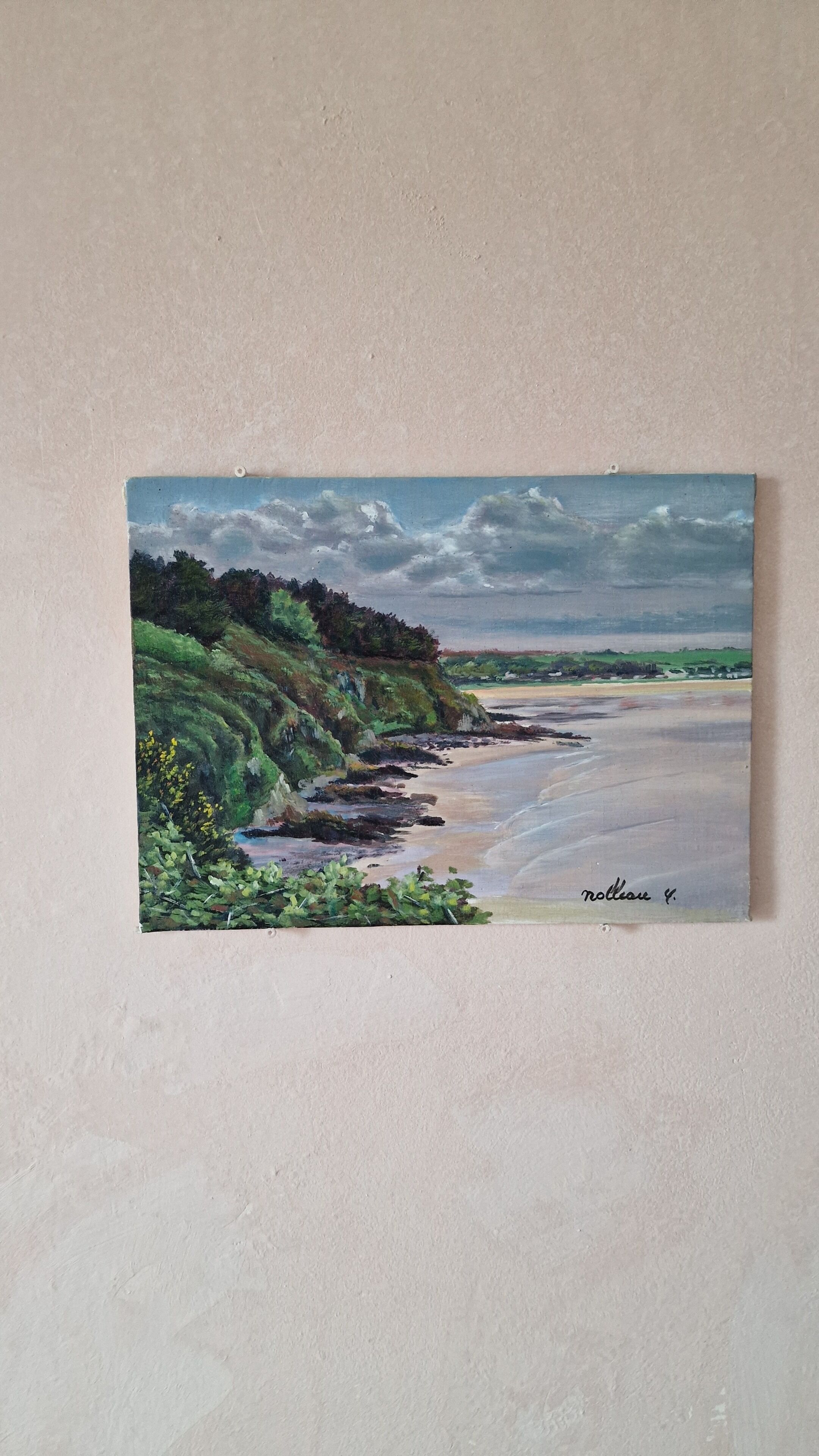 A painting of a coastal landscape with a beach, cliffs, and vegetation.