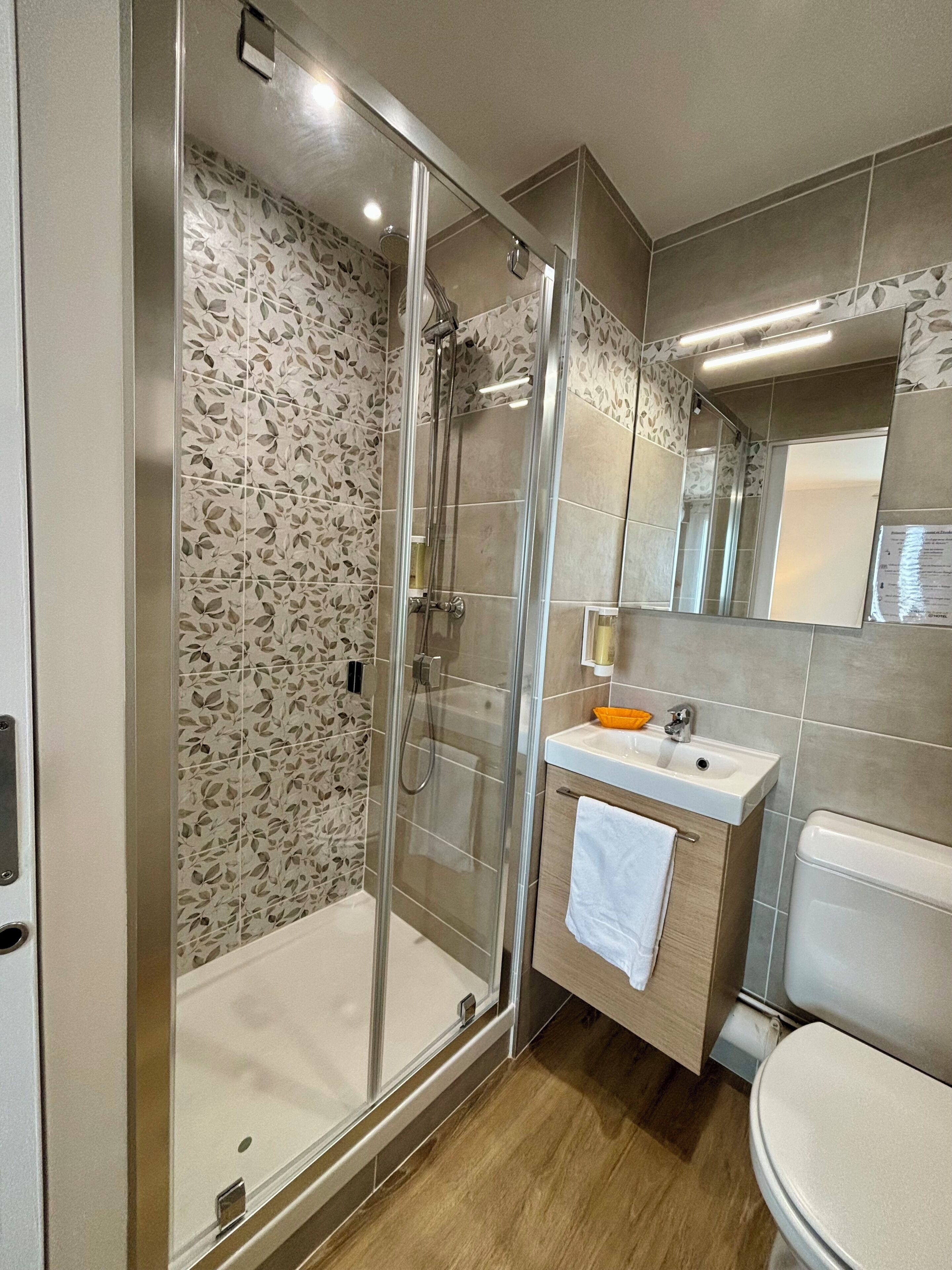 Shower, free toiletries, hair dryer, towels