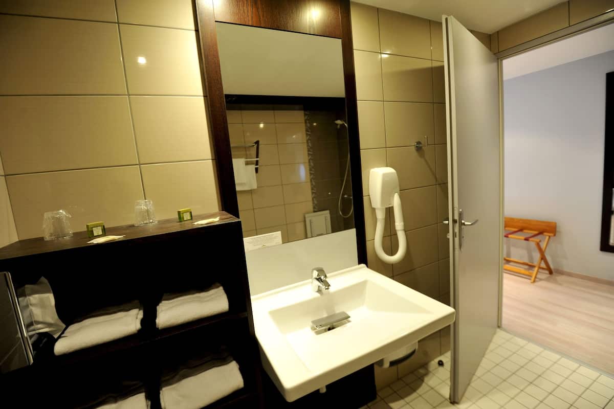 shower, eco-friendly toiletries, hair dryer, towels