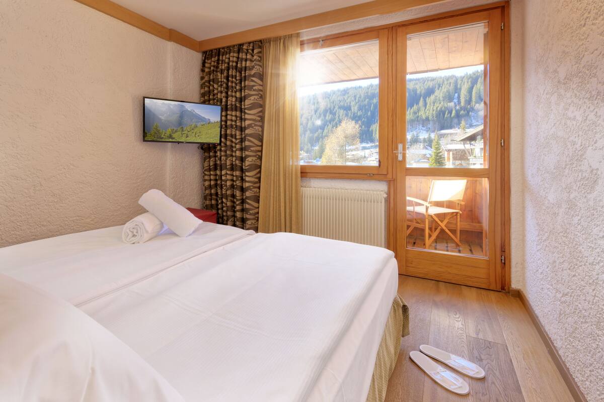 Camera tripla | Biancheria da letto di alta qualità, minibar, una cassaforte in camera