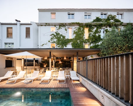 Outdoor pool, open 8:00 AM to 9:00 PM, pool umbrellas, sun loungers