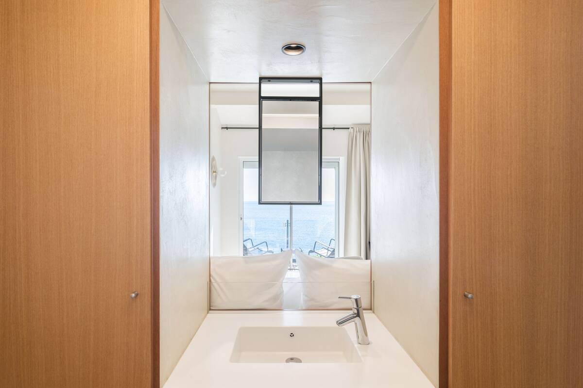 superior room, balcony, sea view | bathroom | shower, rainfall showerhead, designer toiletries, hair dryer