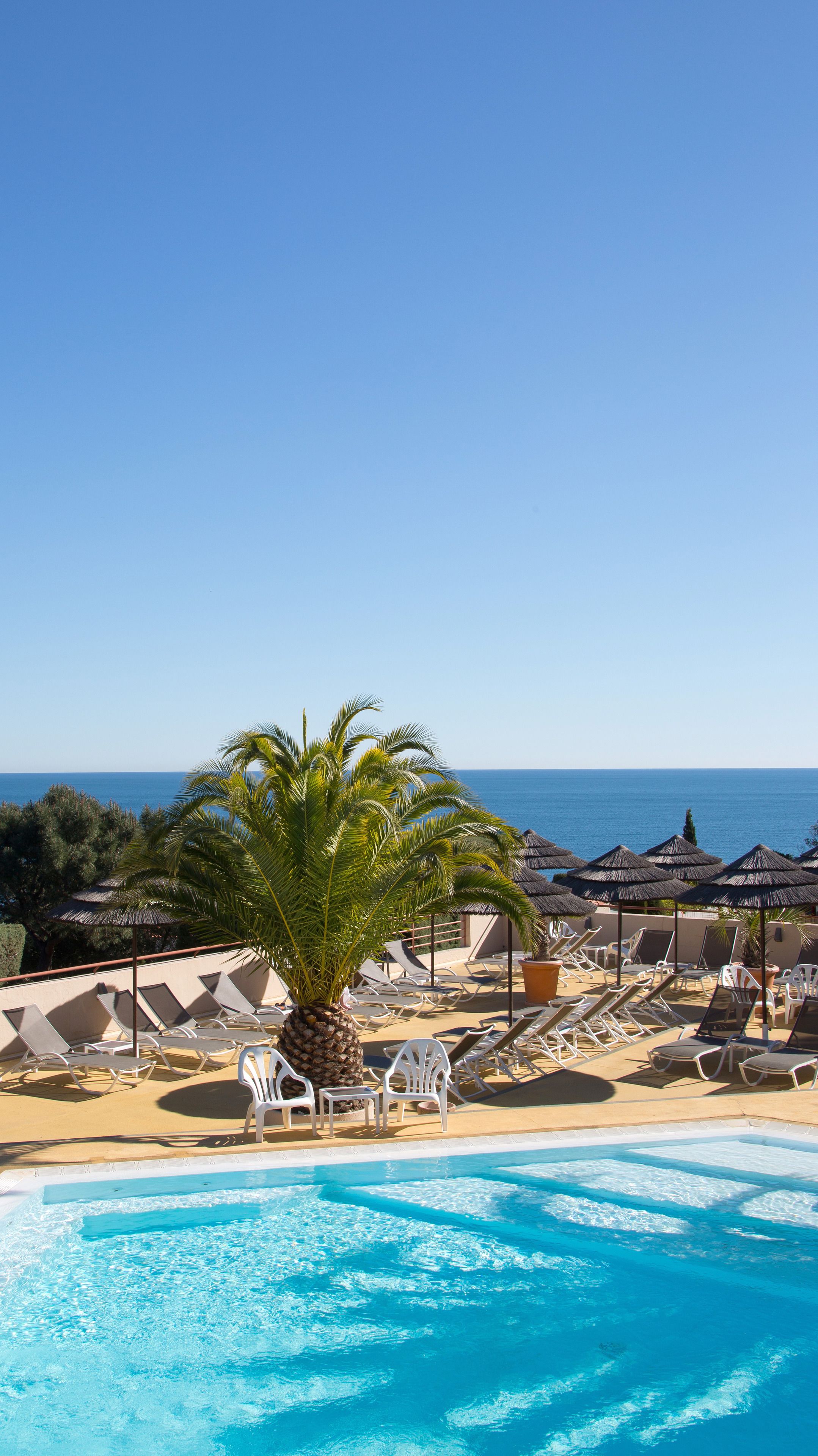 outdoor pool, pool umbrellas, pool loungers