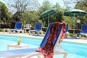 Outdoor pool, open 10:00 AM to 8:00 PM, free pool cabanas