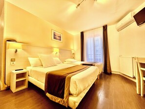 Quarto triplo | Berços (sobretaxa), camas extras/dobráveis (sobretaxa)