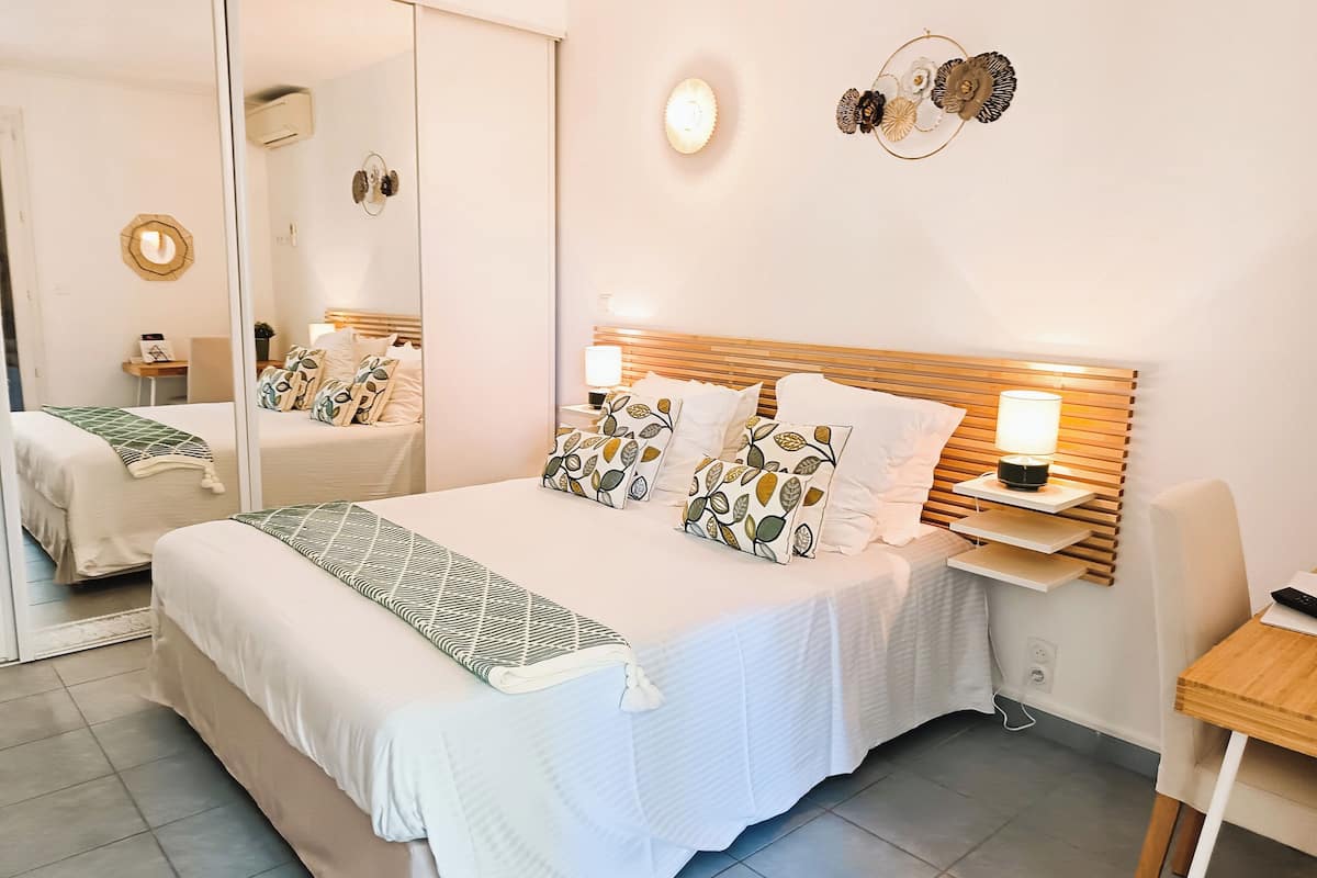 family suite, garden view | 1 bedroom, individually decorated, desk, laptop workspace