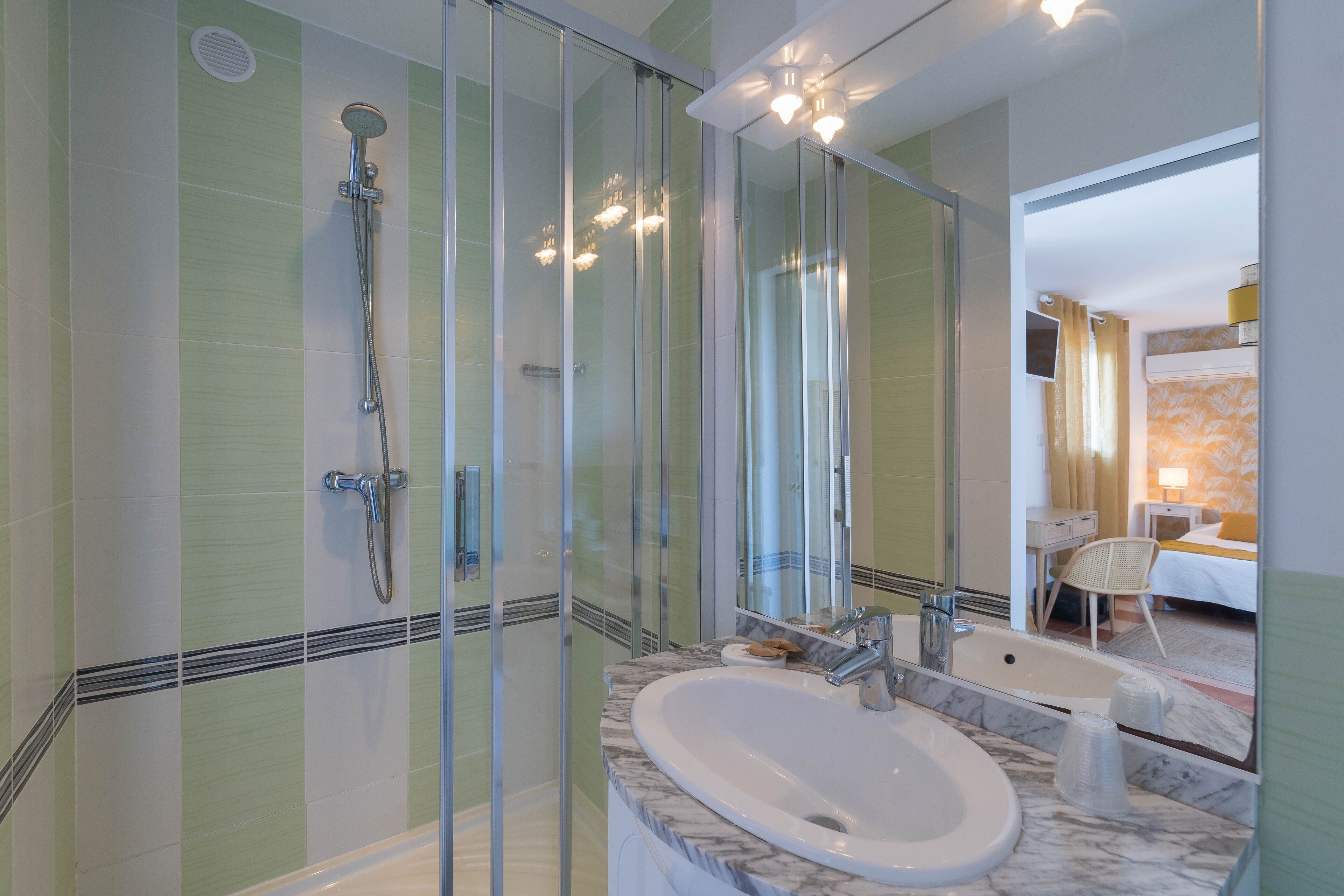 economic room access and view on parking | bathroom | free toiletries, hair dryer, towels