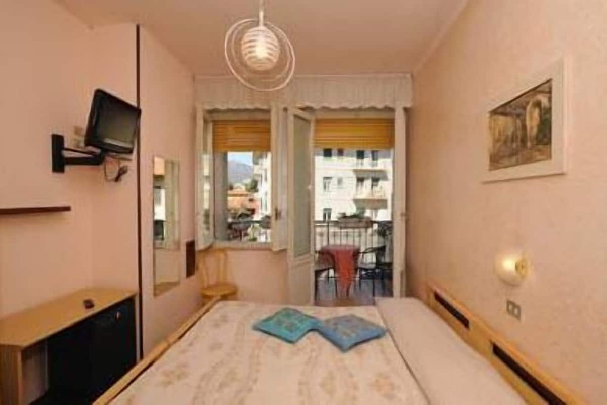 double or twin room | down duvets, minibar, in-room safe, desk