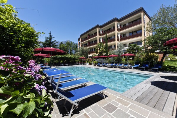 Seasonal outdoor pool, pool umbrellas, sun loungers