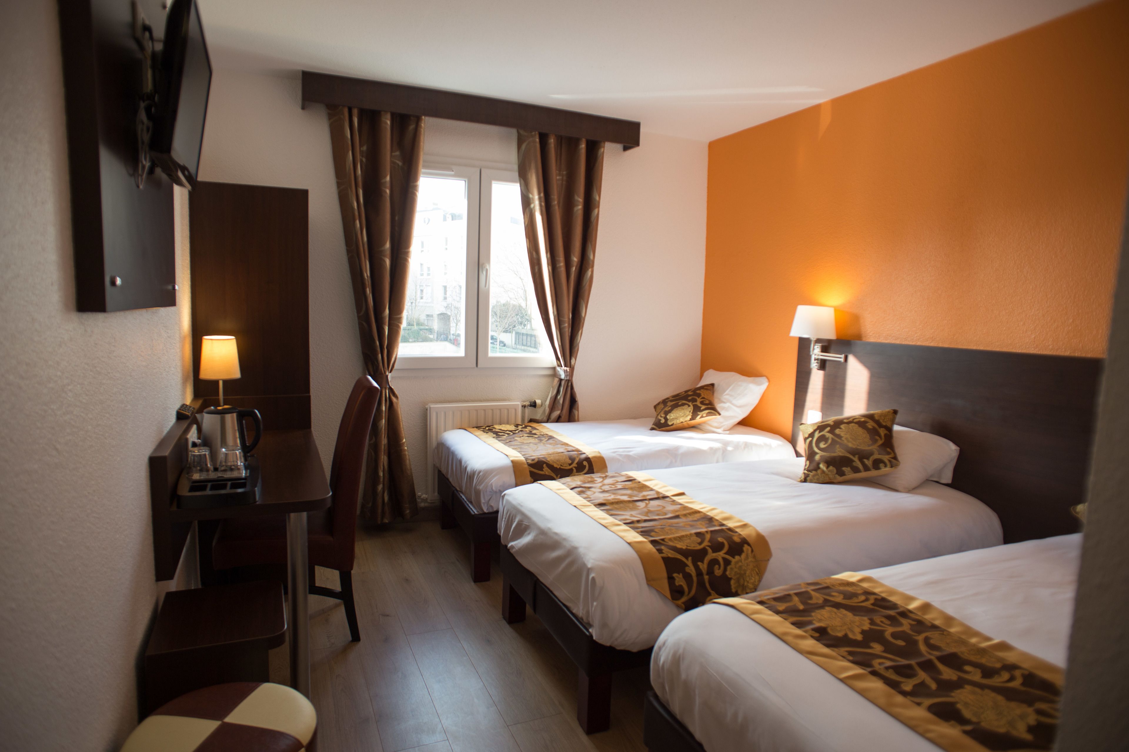 Standard Triple Room | Desk, blackout curtains, iron/ironing board, free cots/infant beds