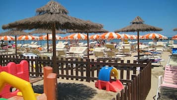 Praia particular, toalhas de praia