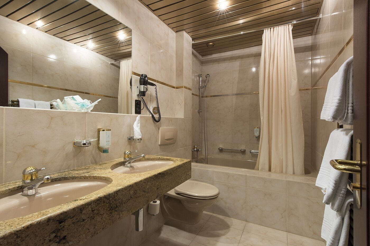 junior studio suite, lake view | bathroom | hair dryer, bathrobes, towels